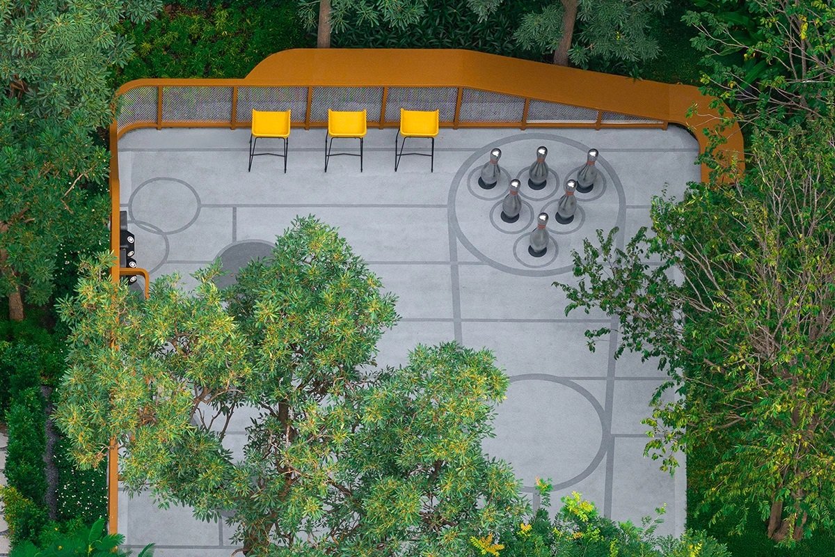 dcondo Shine Rangsit: Aerial view of an outdoor recreational area surrounded by greenery at dcondo Shine Rangsit.