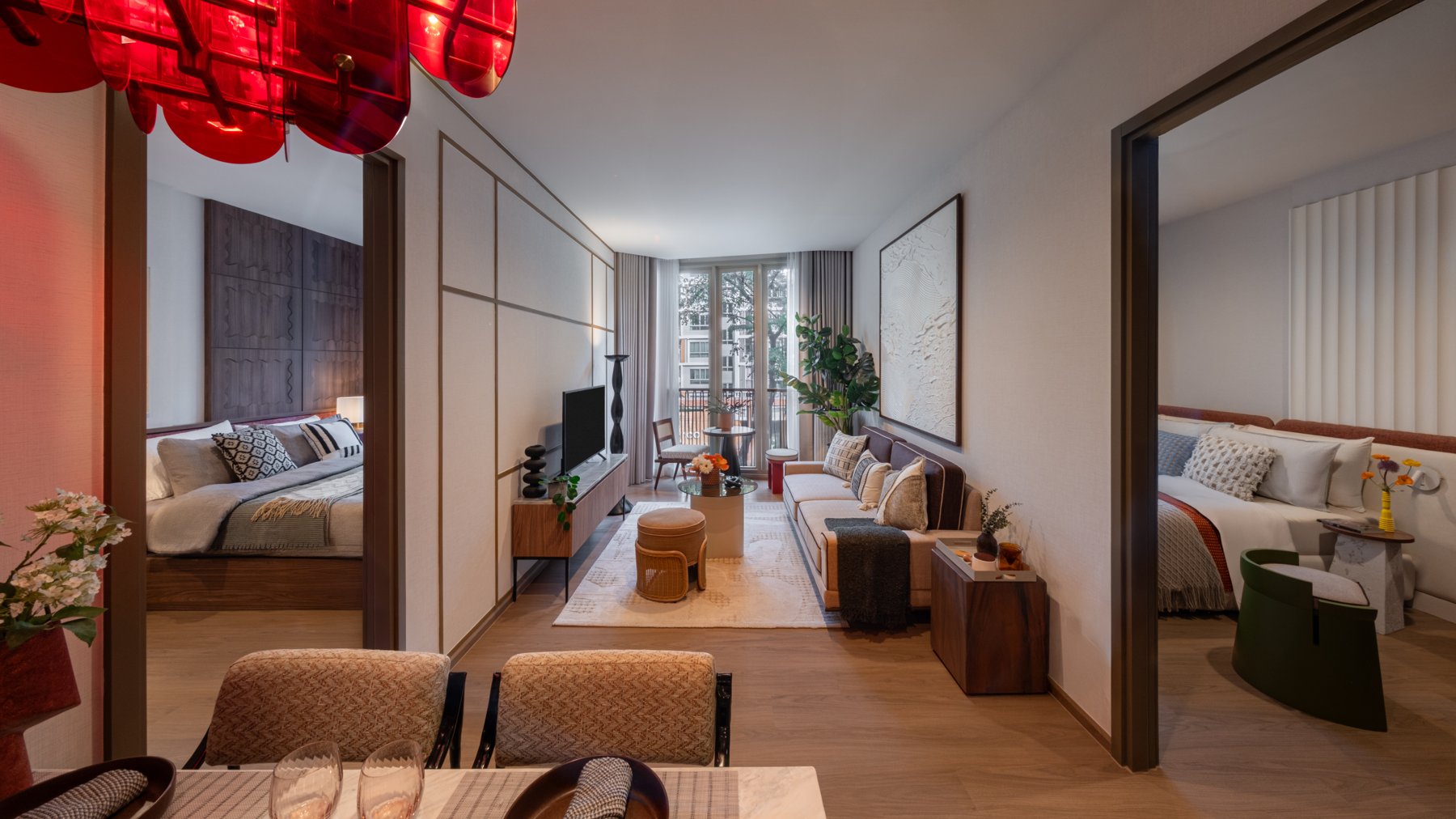 Mekin Haus: Intérieur d'une unité Mekin Haus montrant l'espace de vie ouvert et les entrées de deux chambres.