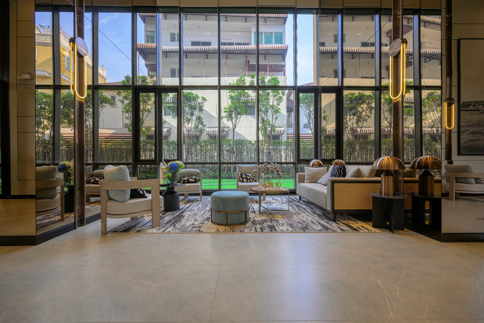 Developer-supplied lobby image; shared project facilities.
