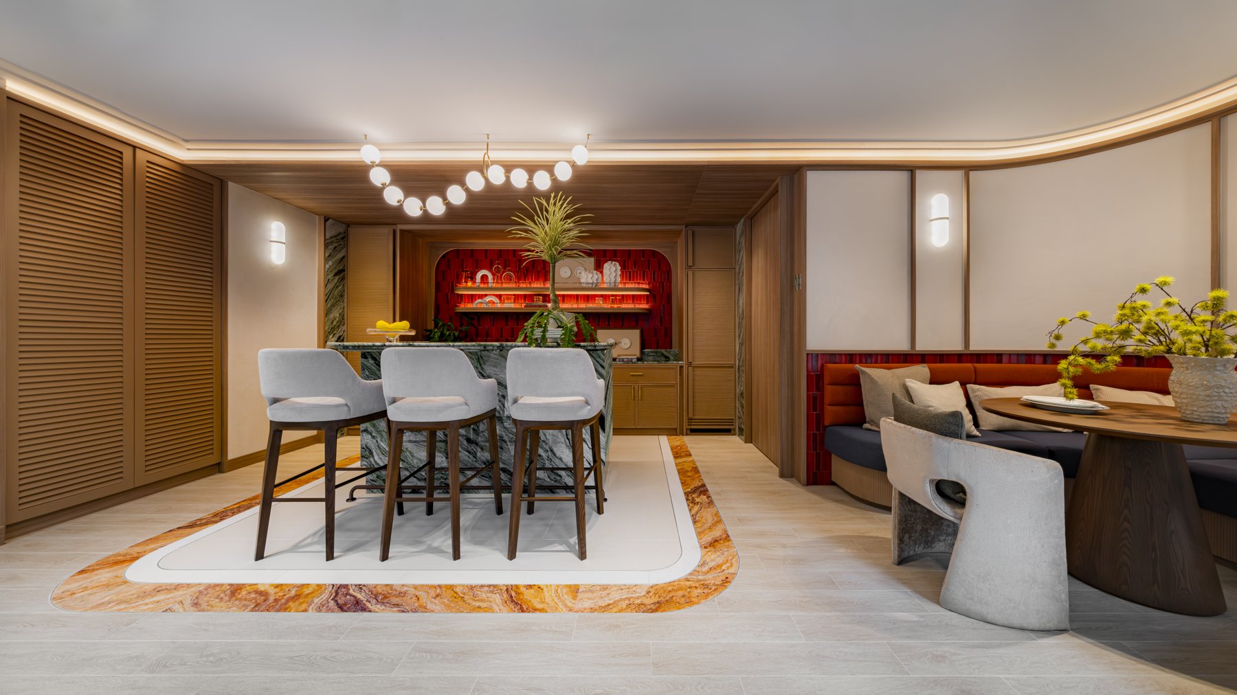 The Base Cherngtalay: The stylish community co-kitchen with a bar and dining area.