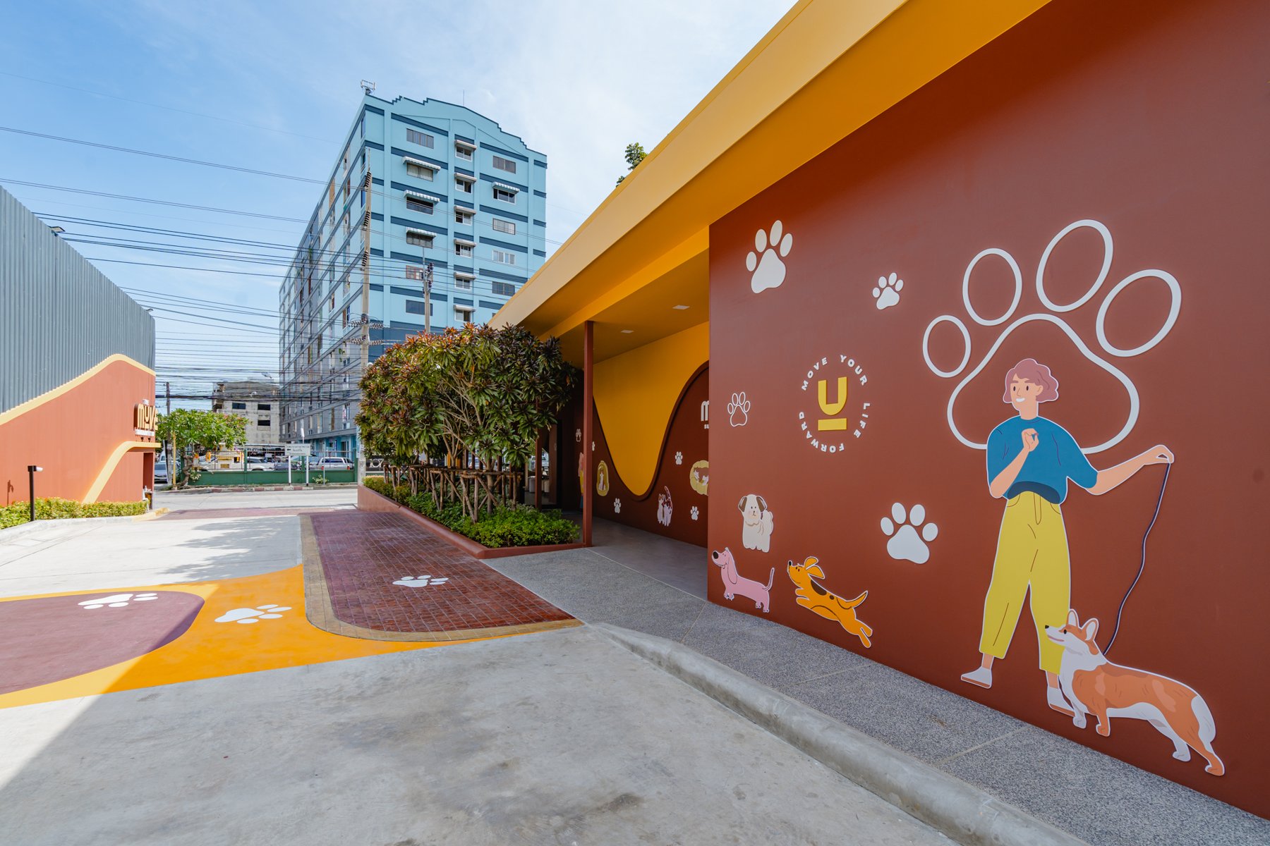 The MUVE Sukhumvit 107: The outdoor pet park area at The MUVE Sukhumvit 107 with fun wall art.